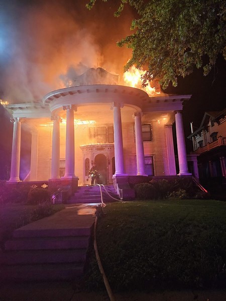Decatur firefighters extinguish large house fire next to historic mansion