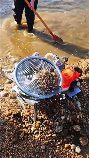 Small vibrating disc gold panning machine.