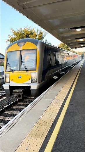 TRANSLINK TRAIN ARRIVING at LISBURN TRAIN STATION in NORTHERN IRELAND