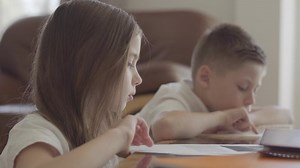 clip-1029548531-close-portrait-twin-sister-her-tired-brother