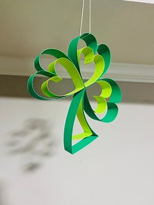 DIY paper shamrocks | How cute are these 3D paper shamrocks?! ☘️✨ It’s the perfect St. Patrick’s Day decoration—light, festive, and so fun to make! I’ve used 11-inch and 8-inch strips, both about 1 inch wide, to create this layered heart design. Hang it up for a lucky touch or use it as a table centerpiece! 🍀💚 Try it yourself and bring some handmade charm to your celebrations!#DIYShamrock #diystpatricksday #stpatricks #PaperCrafts #HandmadeDecor #StPatricksDayVibes #stpatricksdecor #greendecor