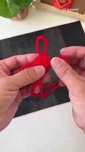 1.1K views · 11 reactions | With the Spring Festival approaching, why not craft your own lucky knot with red strings? It’s the perfect way to welcome a year of prosperity and peace! Save this post and give it a try! #ChineseNewYear #ChineseKnots #SpringFestival Video/Weibo | Wang Guan - public page | Facebook
