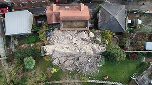 Lewes castle collapse - Emergency crews search rubble after medieval wall collapses onto house