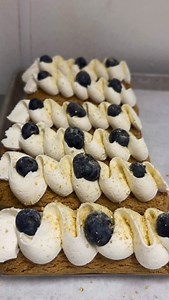 Featuring a delicate pâte à choux shell filled with luscious lemon and blueberry cream, this Blueberry Citron Éclair is topped with a silky ribbon of fresh whipped cream, plump blueberries, and a dusting of graham craquelin. 🫐🍋 What makes this treat even sweeter? You can earn Bonus Points on this pastry and more French favorites during our Summer in Paris event, happening through August 11. View the full Bonus Points checklist here! >>> https://hubs.li/Q02JYFmS0 | Dorothy Lane Market