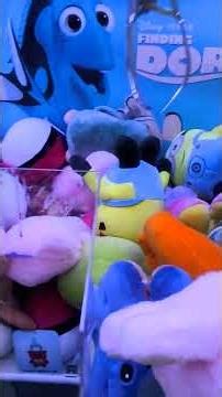 Trying to win bob the minion On The Smart Industries prize time deluxe Amusements plush claw machine