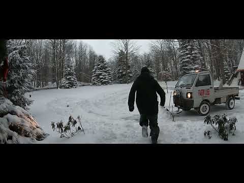 Plowing snow with Japanese mini truck