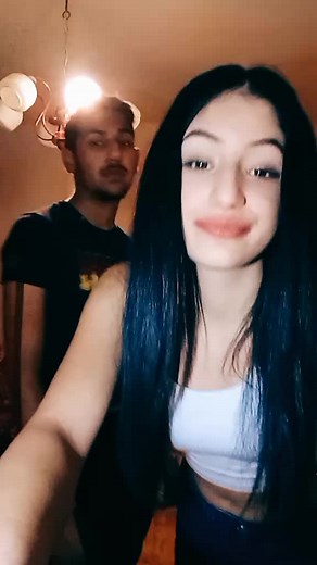 Affectionate Moments Between Couple at Home