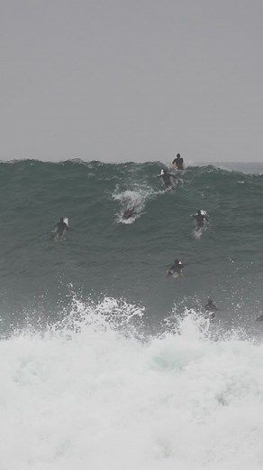 Surfers vs. massive waves at the Wedge in Newport Beach 🌊 #fyp #foryou #surfing #surf #surftok #massive #wedge #newport
