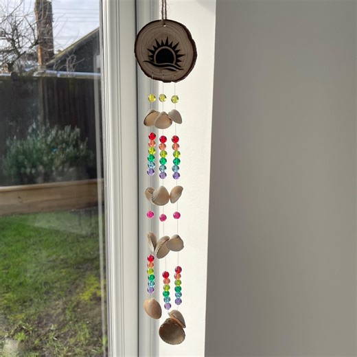 Sea Shell Wind Chime With Sun Design on a Wooden Pine Slice and Rainbow Colour Beads Nautical Mobile - Etsy