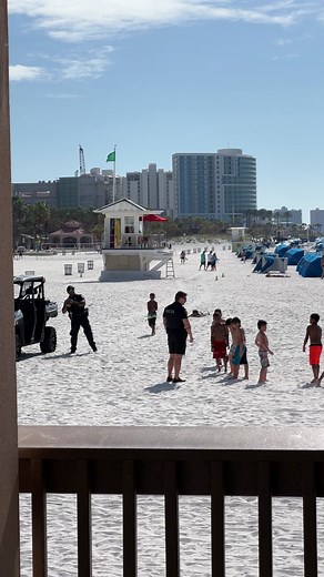 Cops playing ball with the kiddos at the beach. Too wholesome. | Her Two Wheels