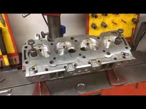 Buick 455 stage 1 head seat installation on IDL seat guide machine