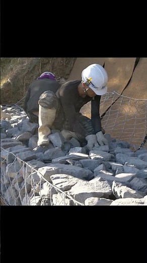Restore the collapsed mountain by stacking thousands of stones