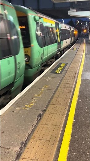 Southern Class 377 Electrostar train approaches Clapham Junction to head for London Victoria station