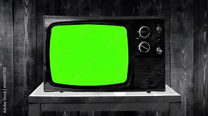 green screen (chroma key) VHS damaged retro CRT television monitor, mock up template old film vintage effects with glitch, nineties technology