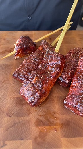 Pork Belly smoked with apple rub, rendered with apple juice and glazed with a "Candy Apple" sauce made of apple jelly and sweet and sour. Candy Apple Pork Belly Ingredients - 1 pork belly - 1/4 cup Honey Mustard - 1/4 cup Apple Rub - 1 cup apple juice - 12oz apple jelly - 12oz sweet and sour sauce Directions 1. Prepare prepare pellet smoker on any other grill/smoker for indirect cooking at 250°F using apple pellets or wood for smoke flavor. 2. Cut pork belly in half and then cut each half into t