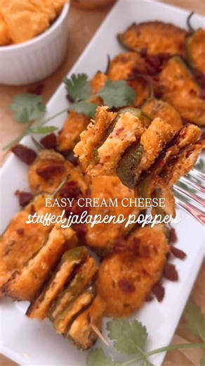 Emily Barlow | Home & Food Blogger on Instagram: "Comment LINK and I’ll send you this delicious NYE and Super Bowl party appetizer! These have been my husband’s favorite for over 15 years! I hope you love them. Fun fact, this was also one of your top favorite recipes shared in 2025! #NYEappetizer #appetizer #jalapenopoppers #stuffedjalapenos #jalapenopopper"