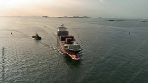 cargo container ship sea freight carrying container and running for export goods from cargo yard port to custom ocean concept technology transportation , customs clearance. logistics supply front view