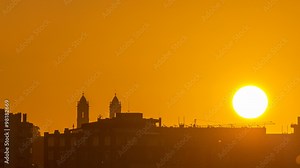 Sunrise over roofs of Porto from bridge at Douro river timelapse. World famous Porto wine production area