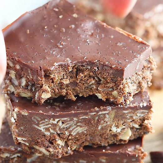 My new sea salt cashew butter chocolate protein bars double as a no-bake treat AND a high-protein snack. Rich chocolatey flavor, a sprinkle of sea salt, and wholesome ingredients - OBSESSED. RECIPE: https://www.ambitiouskitchen.com/2018/01/sea-salt-cashew-butter-chocolate-protein-bars/ | Ambitious Kitchen