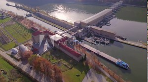 Cargo Pusher Transport Boat Traversing a Lock Moving Freight and Goods