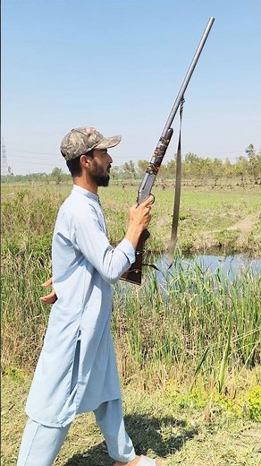One Hand vs. Old School 12 Gauge!