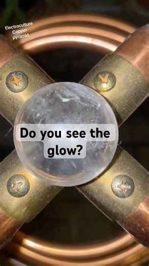 Copper pyramid, can you see the glow? #electroculture