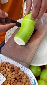 the process of cutting cucumbers quickly using a sharp knife, simply, easily, well and correctly.