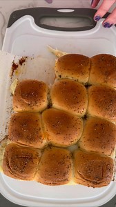 Chicken Parmesan Sliders! 🍔 Easiest Recipe: 1 pkg King’s Hawaiian Rolls 12 Chicken Nuggets (preheated) Marinara sauce (about 1 cup) 12 Mozzarellas slices 1/4 cup butter 1 teaspoon garlic powder 1 teaspoon Italian seasoning Slice rolls in half, place bottom half in square pan, top with nugget, marinara, and cheese. Place top half on top. Melt butter and seasonings and brush on top. Bake at 375° for 15 minutes covered with tin foil. Remove foil and bake 3-4 more minutes. | Neurotic Mom