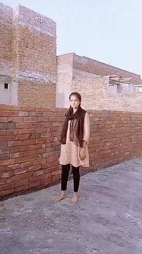 Outdoor Fashion: Pink Dress and Camouflage Style