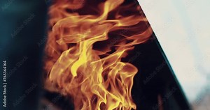 Fires on the piano, a piano burning with a bright flame. Piano on fire, slow motion. Fire from the piano. Artistic concept of the scene.