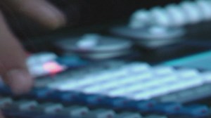 Person using a sound console - Free Stock Video