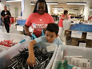 Volunteers Prep 20,000 Backpacks as Part of Operation Backpack®