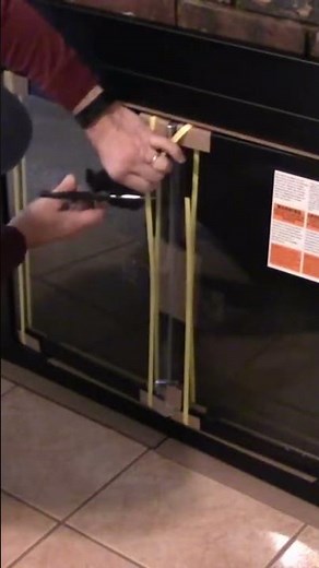 How to install fireplace doors #shortsvideo #diy #fireplace #fireplacedoors