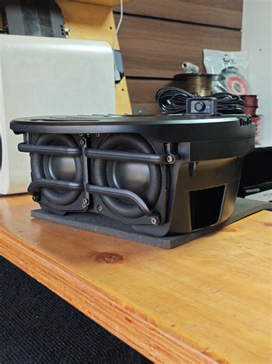 spare wheel tire-powered subwoofer with an inbuilt amplifier.