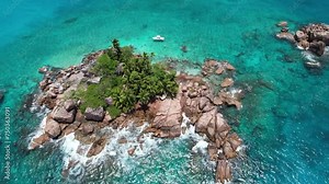 The small island of St. Pierre in the Seychelles, filmed from above.