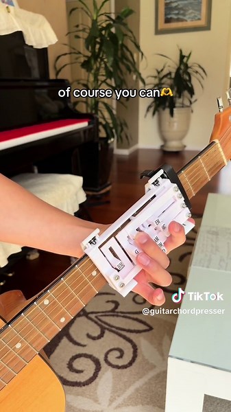 Using Guitar Chord Presser with a Capo: A Comprehensive Guide