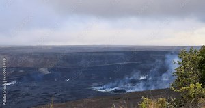 Hilo Hawaii Kīlauea volcano crater. Most active volcano in USA. Smoke, steam, gasses. Big Island in Volcano National Park. Eruptions lava flow. Geological ecosystem and environment.
