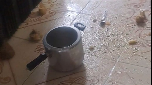 Pressure cooker mishap causes a big mess with the lid stuck in the roof