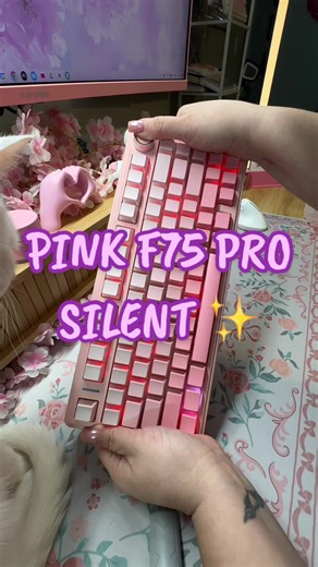 This is the pink 75% version of the viral @Aula F99 Silent 👀💕 The AULA F75 Pro Silent uses the same Feather silent switches and the same shine-through keycaps that let the RGB glow beautifully, just in pink and in a 75% layout. If you loved the F99 but didn’t need the 98%, this just released. Actually silent. Compact. Soft pink glow. Are you choosing 75% or 98%? 👀⌨️ #keebtok #keebsandthingz #pinkmechanicalkeyboard #silentkeyboard #75percentkeyboard aula f75 pro silent pink pink aula f75 pro r