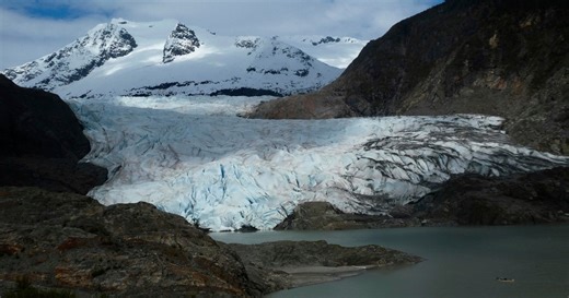 Alaska home collapses into flooded river
