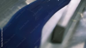 The polyurethane flows into shape. Liquid polyurethane is poured from the reactor before thermostating. Manufacturing of polyurethane sheet. Polyurethane sheet