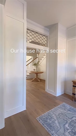 Jessica | Old Barn Company | house plans + on Instagram: "I created this hidden door using trim when we were building our home. I didn’t want to see a door in our foyer and I didn’t want to lose this storage space. So this was the perfect solution! What’s inside? It’s a closet with deep shelves. Our large laser printer, paper, electronic stuff, and photography/filming things like tripods, camera, etc. Follow for more home building tips and ideas!"