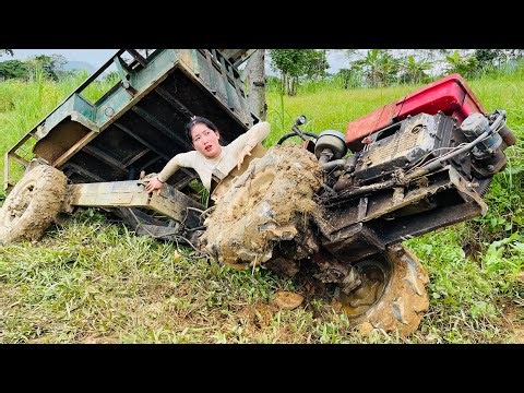 Agricultural vehicle transporting timber for logging, vehicle stuck, successfully pulled