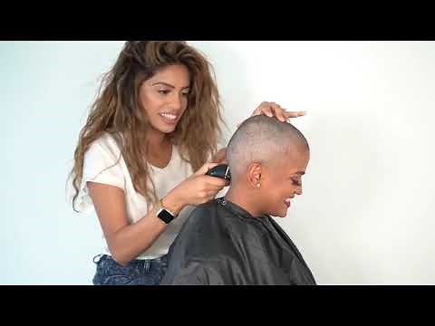 beautiful women head shave with clipper by a women barber