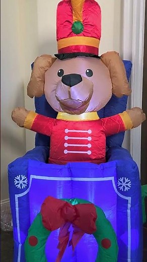 Home Accents Holiday 5 ft Pre-Lit LED Animated Airblown Pop Up Toy Soldier Dog Christmas Inflatable