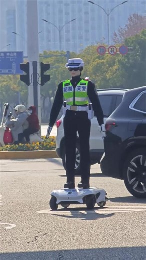 AI-powered robot traffic cop has officially taken to the streets in Wuhu City, east China's Anhui Province. More than a tech showcase, the tireless "traffic officer" on duty around the clock represents a tangible step toward smarter, safer urban intersections. | China Xinhua Sci-Tech