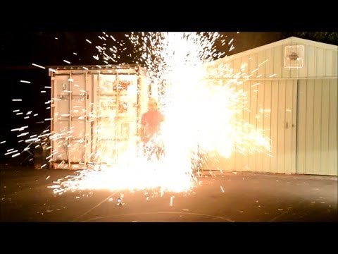 Explosion from high voltage capacitor bank into steel wool gives a big shower of sparks