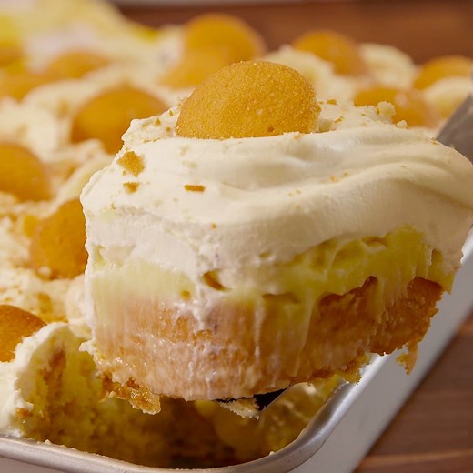 We're going bananas over Banana Pudding Poke Cake. Full recipe: http://dlsh.it/hwTlM3R | Delish
