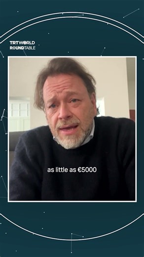 WHY did Greek colonel become a 'SPY'?