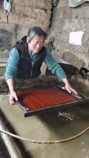 Traditional Paper-Making Process in a Rustic Workshop